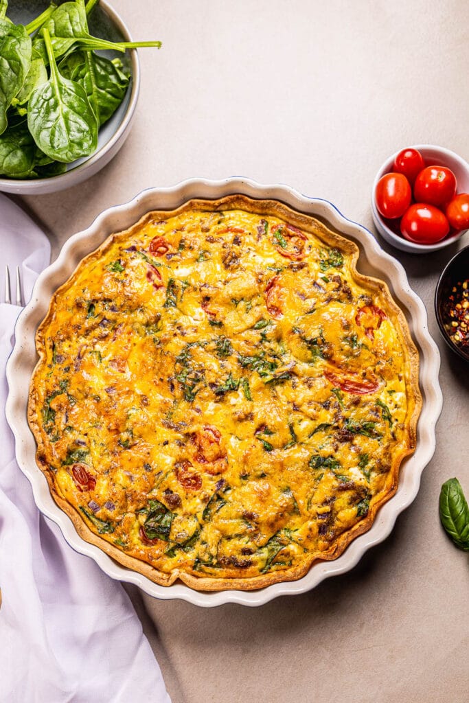 This is an image of tortilla quiche in a baking dish after baking.