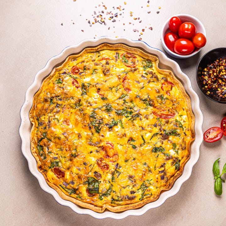 This is an image of a high-protein tortilla quiche in a baking dish