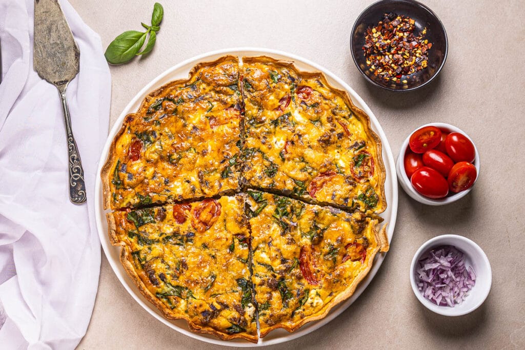 This is an image of sliced tortilla quiche in a plate