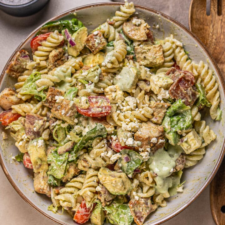 This is a photo of a pasta salad with lime dressing in a plate