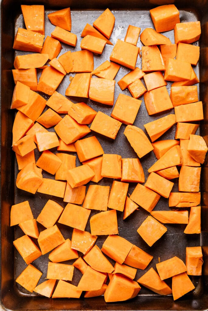 This a photo of DICED SWEET POTATOES ABOUT TO BE ROASTED