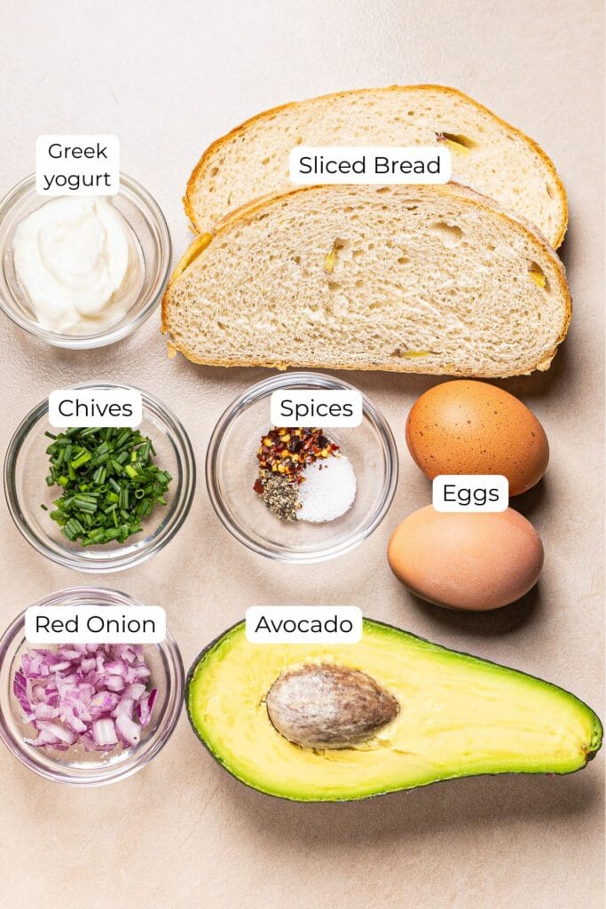 this is an image of smashed avocado toast with eggs recipe ingredients.