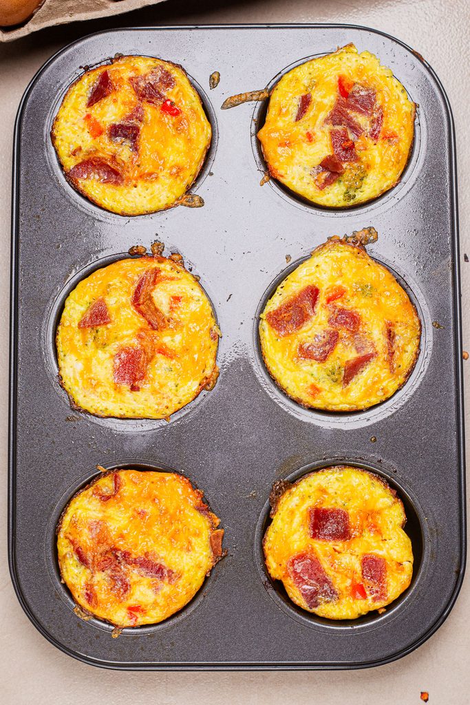 Eggs muffin in a muffin tin after baking.